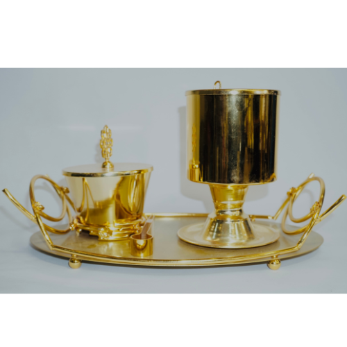 Golden serving set with a container and a holder